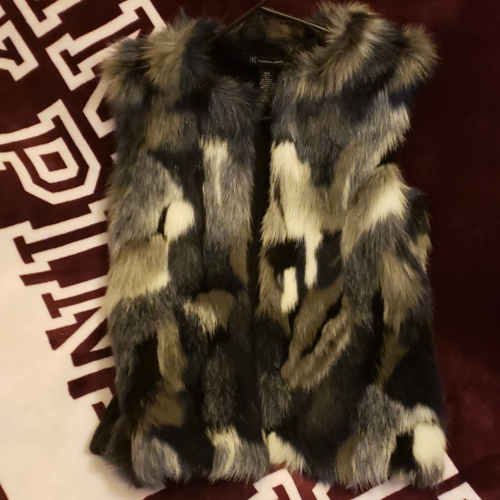 Never worn fur vest no returns!